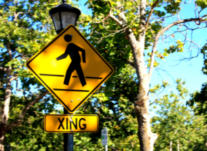 Pedestrian Walking Road Sign | Pedestrian Accidents | Rinehardt Injury Attorneys